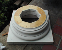 New turned column base.
